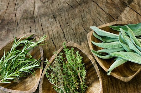 spice gardens - Fresh aromatic herbs on old wooden background Stock Photo - Budget Royalty-Free & Subscription, Code: 400-05382455