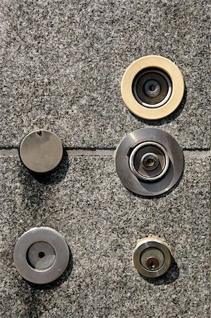 simsearch:400-06874808,k - Many keyholes in a wall. Photographie de stock - Aubaine LD & Abonnement, Code: 400-05383044