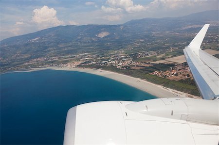 simsearch:400-04964559,k - Airplane Wing view from Window during Flight Foto de stock - Super Valor sin royalties y Suscripción, Código: 400-05383126