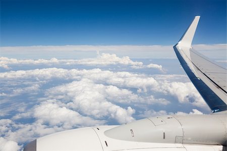 simsearch:400-08336254,k - Airplane Wing view from Window during Flight Stock Photo - Budget Royalty-Free & Subscription, Code: 400-05383127