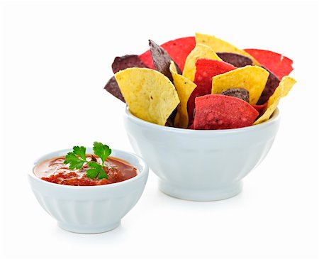 Bowl of salsa with colorful tortilla chips isolated on white background Stock Photo - Budget Royalty-Free & Subscription, Code: 400-05383346