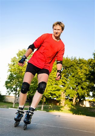 Young active roller blade skater on the park Stock Photo - Budget Royalty-Free & Subscription, Code: 400-05664144