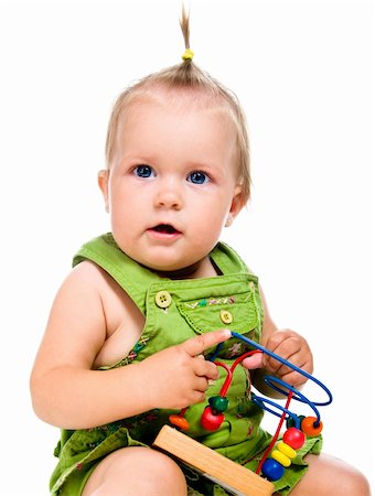 simsearch:400-04161270,k - small baby with developmental toy on a white background Foto de stock - Super Valor sin royalties y Suscripción, Código: 400-05664159