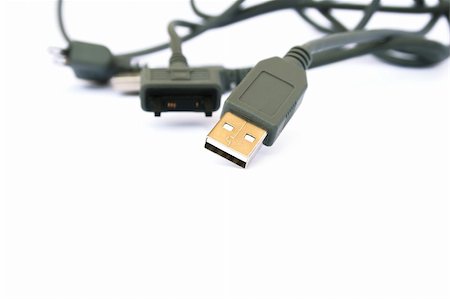 simsearch:400-04261957,k - USB cable and plug isolated on white background. Foto de stock - Super Valor sin royalties y Suscripción, Código: 400-05664927