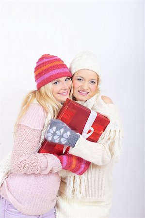 Two pretty winter girls friends making presents Stock Photo - Budget Royalty-Free & Subscription, Code: 400-05664947