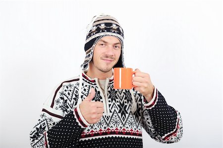 funny freezing cold photos - handsome winter man drinking hot tea Stock Photo - Budget Royalty-Free & Subscription, Code: 400-05664941