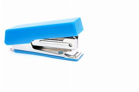 simsearch:400-04833580,k - Blue stapler isolated on white background. Foto de stock - Super Valor sin royalties y Suscripción, Código: 400-05665490