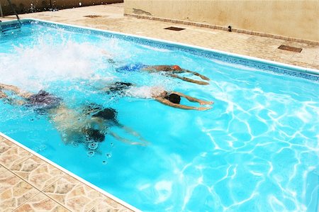 family jump into swimming pool images - People having fun in  swimming pool. Stock Photo - Budget Royalty-Free & Subscription, Code: 400-05665511