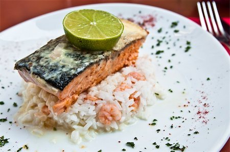 poached salmon - grilled salmon and lemon - french cuisine dish with salmon Stock Photo - Budget Royalty-Free & Subscription, Code: 400-05665685