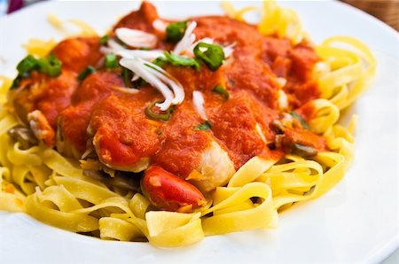 scallop, tomato - Pasta with Scallops Dinner Dish on a the table Stock Photo - Budget Royalty-Free & Subscription, Code: 400-05665717