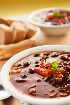 steaming soup - Chilli con carne with red pepper and parsley Stock Photo - Budget Royalty-Free & Subscription, Code: 400-05666505