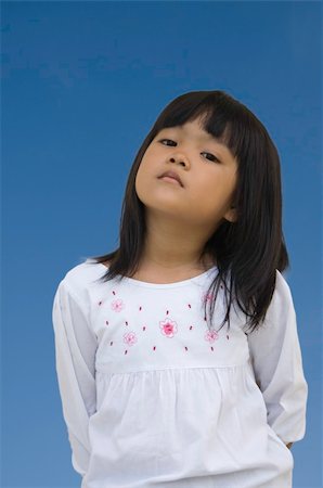 Young asian children in standing action Stock Photo - Budget Royalty-Free & Subscription, Code: 400-05668573