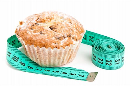Diet muffin and centimiter isolated on a white background Stock Photo - Budget Royalty-Free & Subscription, Code: 400-05668676
