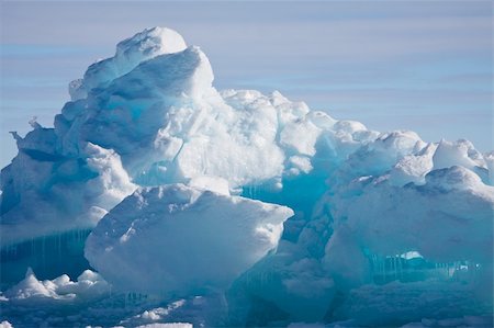Antarctic Glacier with cavities. Beautiful winter background. Foto de stock - Super Valor sin royalties y Suscripción, Código: 400-05668898