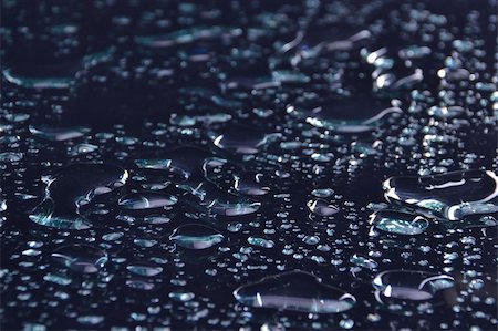 simsearch:400-06078050,k - Drops of water on black glass Stock Photo - Budget Royalty-Free & Subscription, Code: 400-05669005