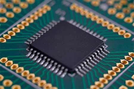 High-tech chip on the green circuit board Stock Photo - Budget Royalty-Free & Subscription, Code: 400-05669008