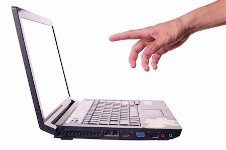 The hand points to the laptop Stock Photo - Budget Royalty-Free & Subscription, Code: 400-05669015