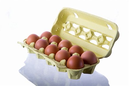 Ten eggs in an egg-box Stock Photo - Budget Royalty-Free & Subscription, Code: 400-05669012