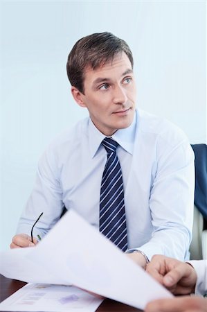 simsearch:400-04879813,k - Business man in a shirt in the office Stock Photo - Budget Royalty-Free & Subscription, Code: 400-05669027