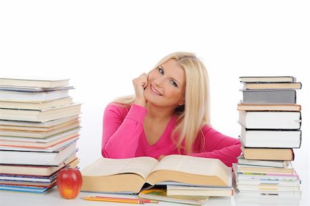 simsearch:400-04351619,k - young pretty smart woman with lots of books reading and study. isolated on white background Foto de stock - Super Valor sin royalties y Suscripción, Código: 400-05669089