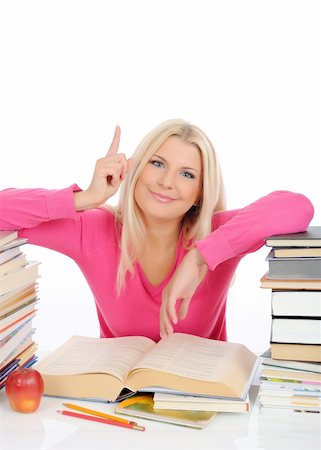 simsearch:400-04351619,k - young pretty smart woman with lots of books reading and study. isolated on white background Foto de stock - Super Valor sin royalties y Suscripción, Código: 400-05669091