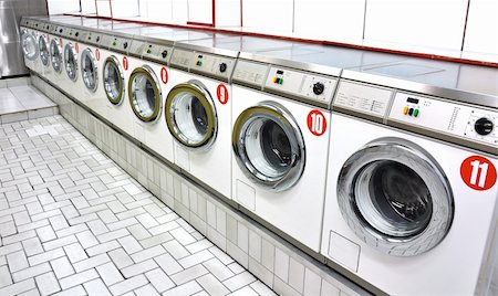 Row of washing machines in a laundrette Stock Photo - Budget Royalty-Free & Subscription, Code: 400-05669299