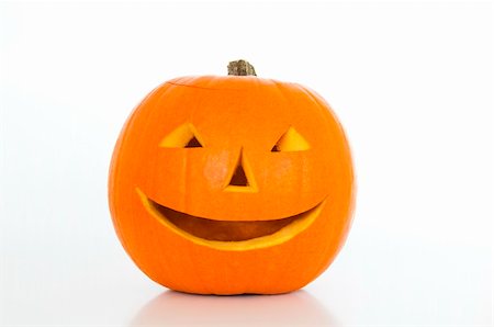 sinister smile - Halloween lantern on a white background Stock Photo - Budget Royalty-Free & Subscription, Code: 400-05669337