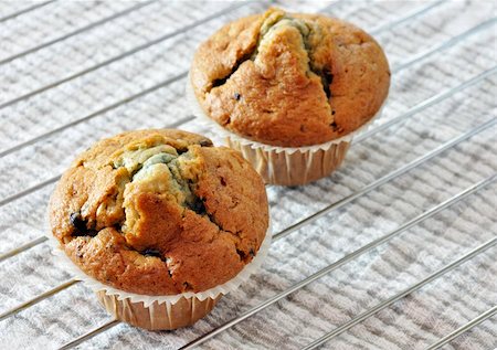 Two freshly baked blueberry muffins Stock Photo - Budget Royalty-Free & Subscription, Code: 400-05669398