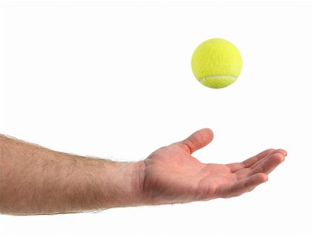 Sporting tennis ball isolated against a white background Stock Photo - Budget Royalty-Free & Subscription, Code: 400-05669450