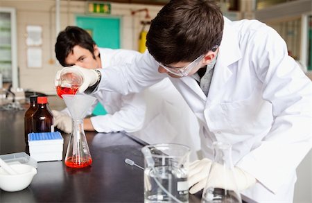 Students making an experiment in a laboratory Stock Photo - Budget Royalty-Free & Subscription, Code: 400-05669753