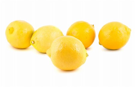 Yellow ripe lemons isolated on white background Stock Photo - Budget Royalty-Free & Subscription, Code: 400-05669892