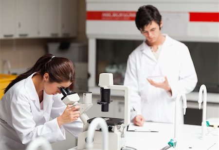 simsearch:400-05670478,k - Young science students making experiments in a laboratory Stock Photo - Budget Royalty-Free & Subscription, Code: 400-05669981