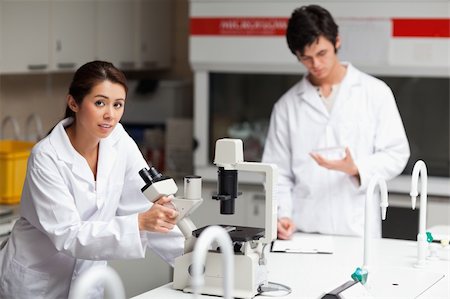simsearch:400-05670478,k - Good looking science students making experiments in a laboratory Stock Photo - Budget Royalty-Free & Subscription, Code: 400-05669982