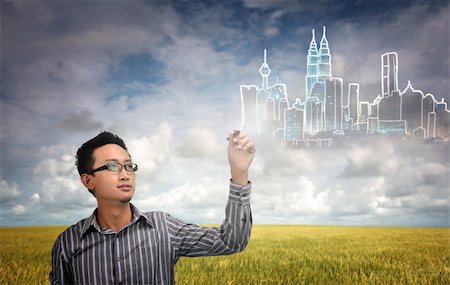 diagrammatic drawing in architecture - asian man with a dream of building a green ecology city , kuala lumpur Stock Photo - Budget Royalty-Free & Subscription, Code: 400-05663274