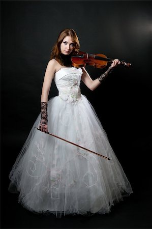 Girl in white dress with violin on black background Stock Photo - Budget Royalty-Free & Subscription, Code: 400-05663316