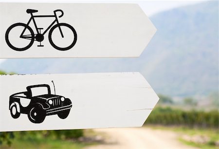 simsearch:400-05151567,k - Cars and bikes way sign close up outdoors Photographie de stock - Aubaine LD & Abonnement, Code: 400-05663489