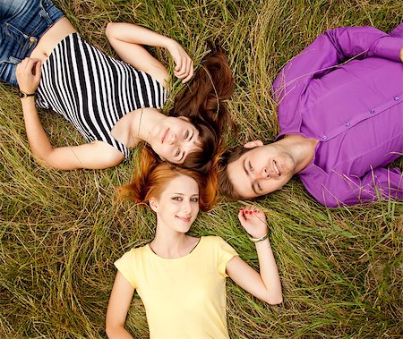 The students at green grass. Stock Photo - Budget Royalty-Free & Subscription, Code: 400-05663719