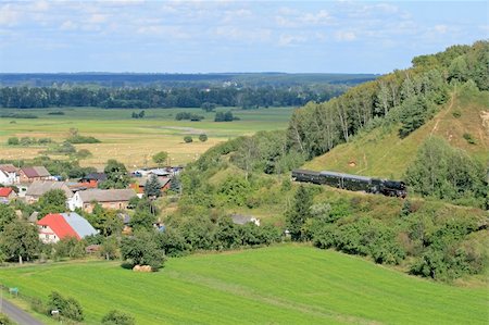 simsearch:400-07680071,k - Beautiful hilly landscape with an old retro steam train Photographie de stock - Aubaine LD & Abonnement, Code: 400-05674063
