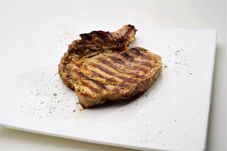 Chicken Steak served on white plate Fotografie stock - Microstock e Abbonamento, Codice: 400-05674529