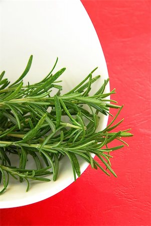 rosemary sprig - fresh rosemary green sprigs in white bowl Stock Photo - Budget Royalty-Free & Subscription, Code: 400-05674656