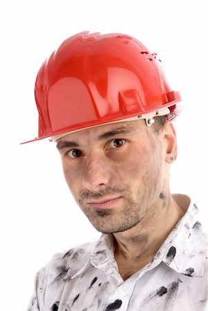 safety helmet dirt - close-up portrait of a young builder or a coal miner Foto de stock - Super Valor sin royalties y Suscripción, Código: 400-05674886