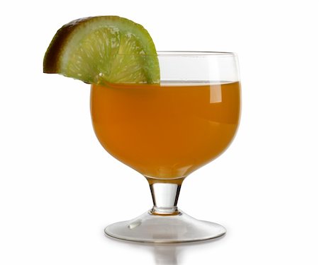 Color photo of a glass cup with a cocktail and lemon Photographie de stock - Aubaine LD & Abonnement, Code: 400-05675194