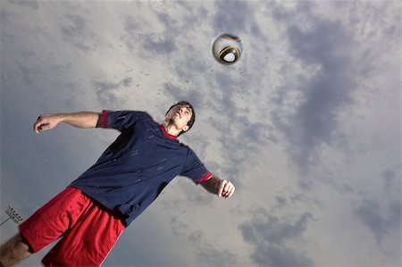 simsearch:400-06513403,k - Image of a soccer player in action Stock Photo - Budget Royalty-Free & Subscription, Code: 400-05675373