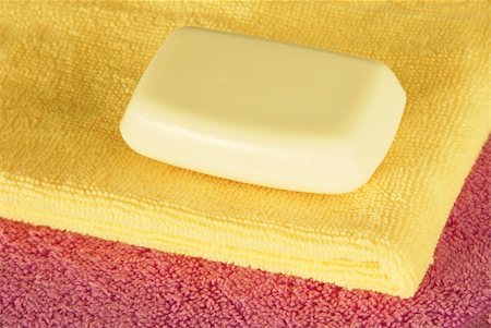 dry body towel - magenta and yellow towels with white soap bar Stock Photo - Budget Royalty-Free & Subscription, Code: 400-05675573