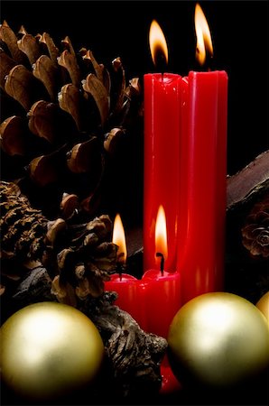 Christmas card with red candles on black background Fotografie stock - Microstock e Abbonamento, Codice: 400-05676069