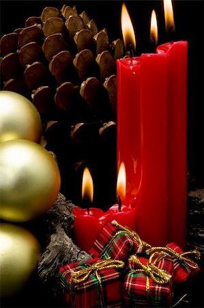 Christmas card with red candles on black background Fotografie stock - Microstock e Abbonamento, Codice: 400-05676071