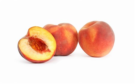 peach slice - Sliced freshness peach fruits on white background. Isolated with clipping path Stock Photo - Budget Royalty-Free & Subscription, Code: 400-05676457