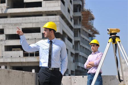 Team of architects people in group  on construciton site check documents and business workflow Stock Photo - Budget Royalty-Free & Subscription, Code: 400-05676841