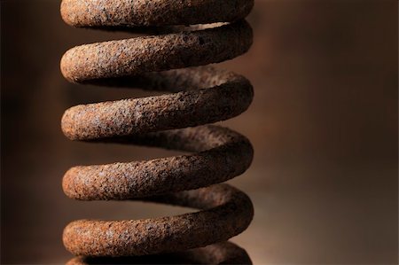 rusted objects images - Old metallic rusty spring in closeup. Stock Photo - Budget Royalty-Free & Subscription, Code: 400-05676984