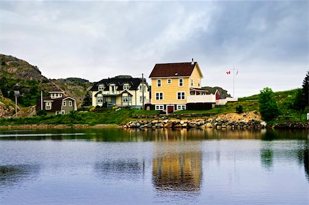 Quaint seaside fishing village in Newfoundland Canada Foto de stock - Super Valor sin royalties y Suscripción, Código: 400-05677089